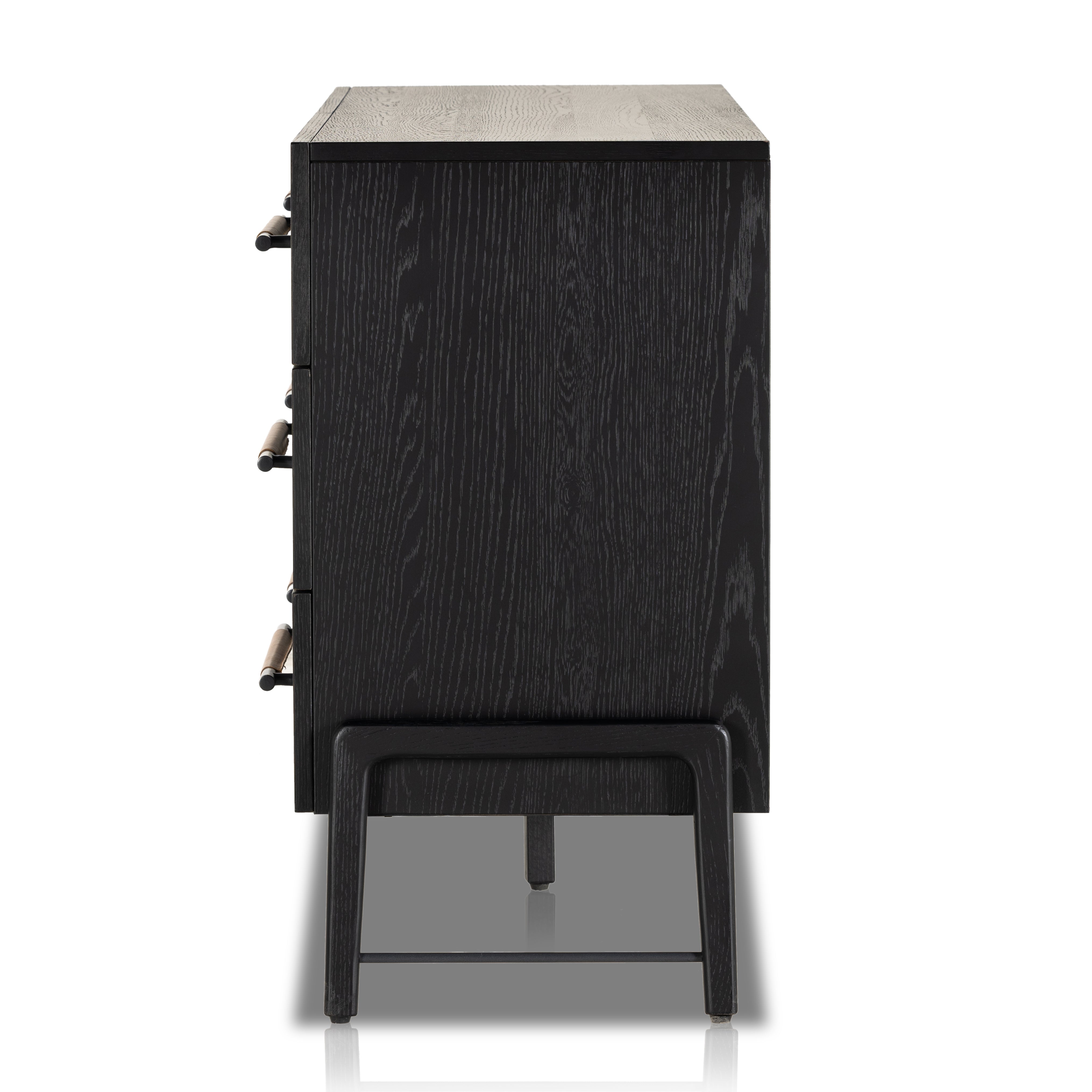 The ebony oak of this Rosedale 6 Drawer Dresser brings a moody, darkness to any room. With six spacious drawers and iron hardware wrapped in a gorgeous, tan leather, this is a functional and beautiful piece to add to your bedroom or other area.  Amethyst Home provides interior design, new home construction design consulting, vintage area rugs, and lighting in the Charlotte metro area.