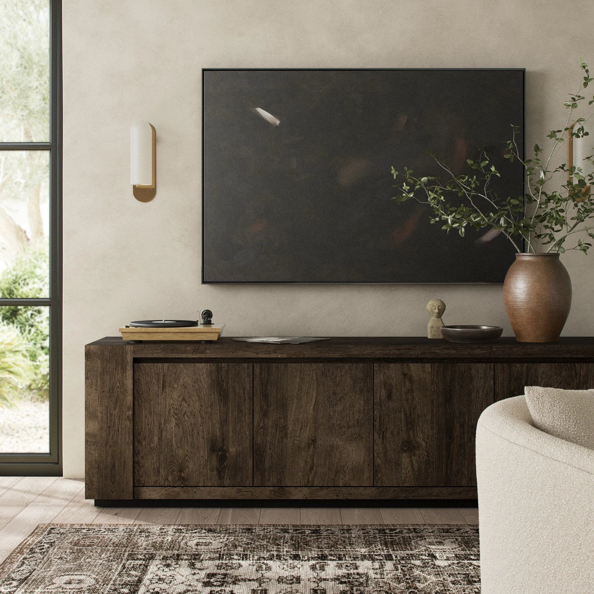 Made from thick-cut oak veneer with a rustic ebony finish, this spacious media console features a pedestal base and dovetail joinery detailing.As enthusiasts of luxe design at Amethyst, we love the nature inspired Abaso Media Console - Ebony Rustic Wormwood Oak. This item pairs well with other brands such as Surya and is perfect for eclectic homes Amethyst Home provides interior design, new home construction design consulting, vintage area rugs, and lighting in the Alpharetta metro area.
