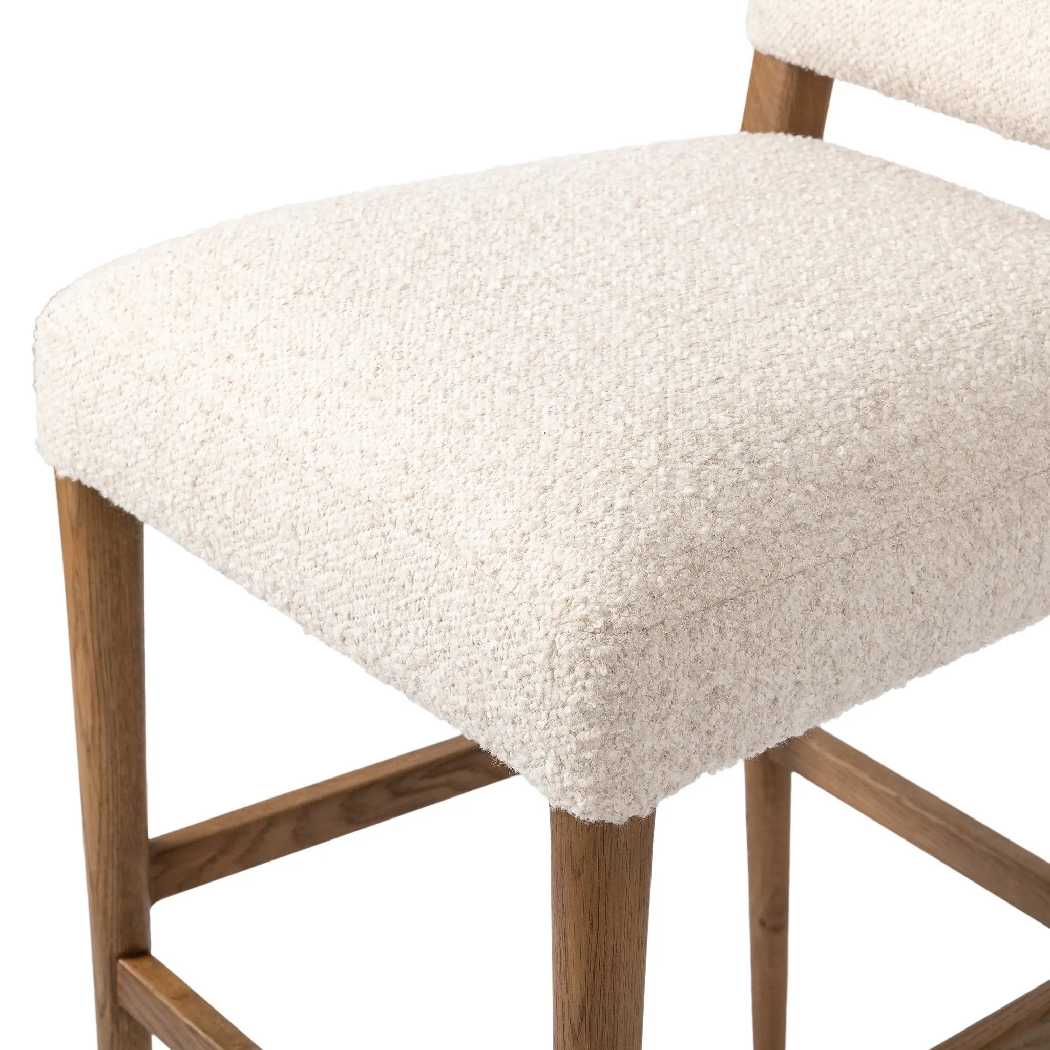 Featuring Abilene Somerton Ash Bar + Counter Stool by Four Hands at Amethyst Home. A heritage design gets a modern twist. Simple tapered legs of warm oak mark this dining room chair's traditional form, while an arched seat back with off-white upholstery updates this comfortable seating style, perfectly sized for the counter. Performance fabrics are speciall. Amethyst Home provides interior design, new home construction design consulting, vintage area rugs, and lighting in the Park City metro area.