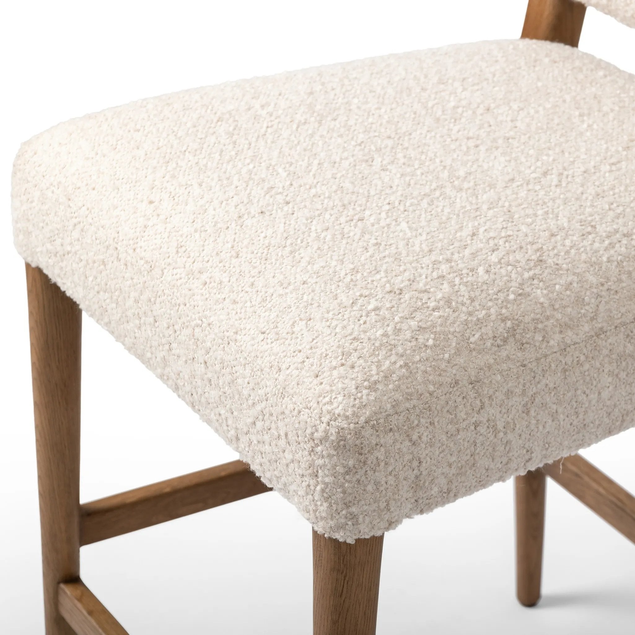 Featuring Abilene Somerton Ash Bar + Counter Stool by Four Hands at Amethyst Home. A heritage design gets a modern twist. Simple tapered legs of warm oak mark this dining room chair's traditional form, while an arched seat back with off-white upholstery updates this comfortable seating style, perfectly sized for the counter. Performance fabrics are speciall. Amethyst Home provides interior design, new home construction design consulting, vintage area rugs, and lighting in the San Diego metro area.