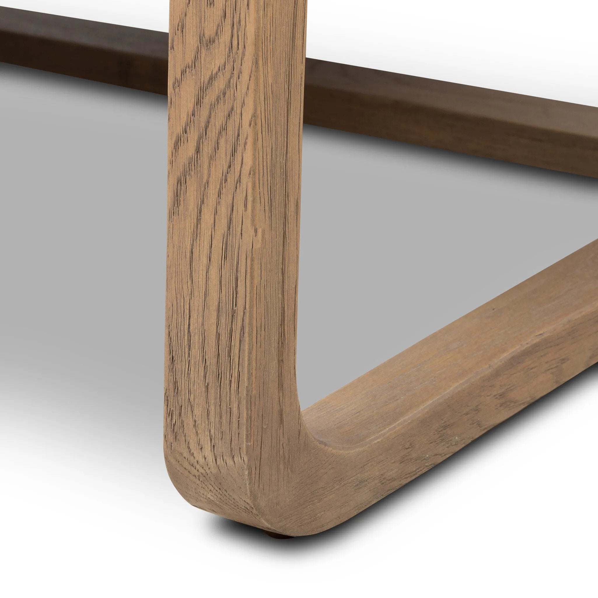 The perfect place to curl up with a good book. A hand-shaped parawood frame supports low, deep seating upholstered with taupe shearling Amethyst Home provides interior design, new home construction design consulting, vintage area rugs, and lighting in the Boston metro area.