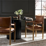 Featuring Adaline Sonoma Chestnut Dining Armchair by Four Hands at Amethyst Home. Elevate your dining space with a mixed-material seat inspired by Nordic minimalism. Plush cushioning upholstered in exclusive top-grain leather add volume, while a natural oak frame lightens the whole look. Overall Dimensions: 25.00"w x 23.50"d x 35.00"h. Amethyst Home provides interior design, new home construction design consulting, vintage area rugs, and lighting in the Kansas City metro area.