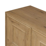 Store favorite dinnerware, table linens and more in this modernized Deco sideboard, with inverted chamfered framing and molding around the doors. Made from solid oak with a light, drifted finish and ski-style legs that elevate the whole piece Amethyst Home provides interior design, new home construction design consulting, vintage area rugs, and lighting in the Miami metro area.