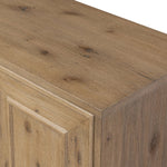 Store favorite dinnerware, table linens and more in this modernized Deco sideboard, with inverted chamfered framing and molding around the doors. Made from solid oak with a light, drifted finish and ski-style legs that elevate the whole piece Amethyst Home provides interior design, new home construction design consulting, vintage area rugs, and lighting in the Nashville metro area.