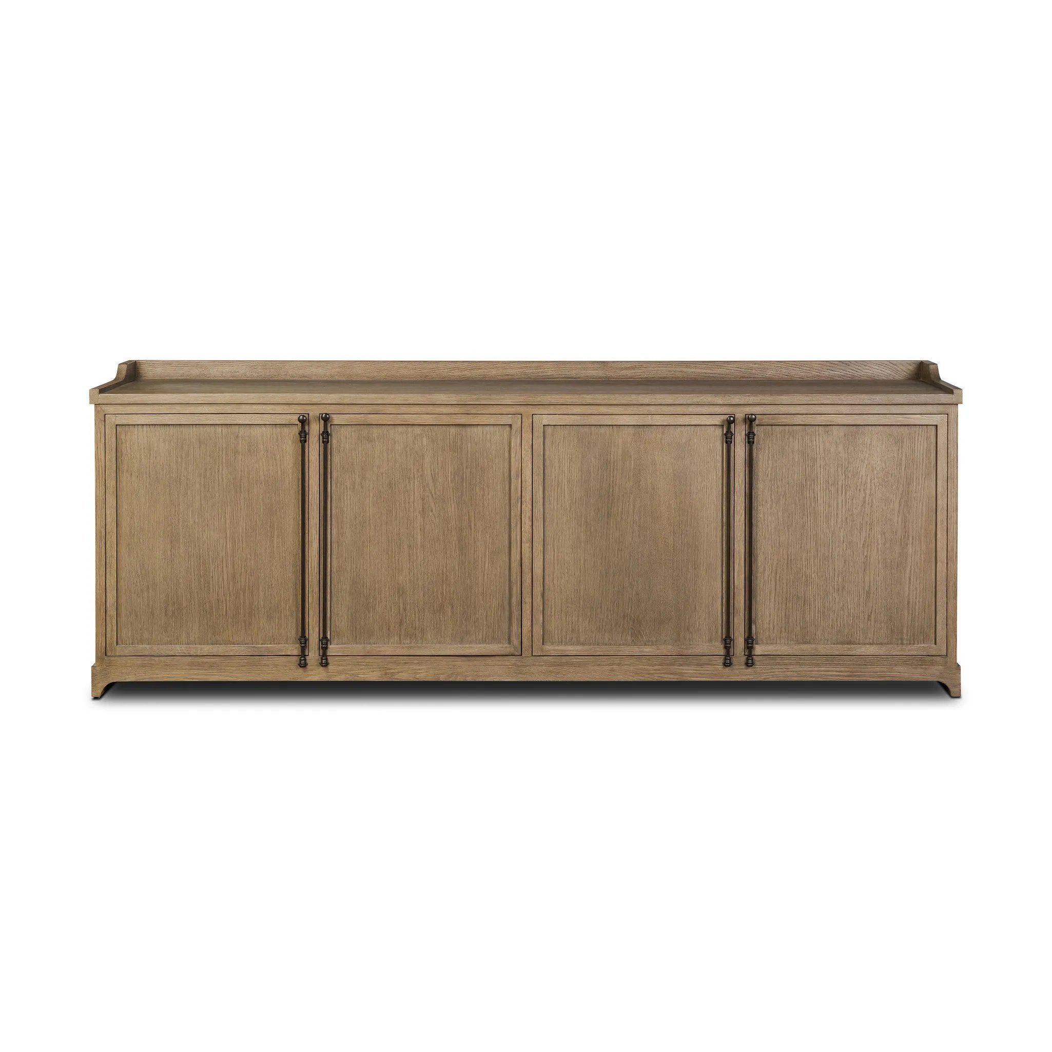 The classic sideboard takes new shape with a unique gallery design on top. Doors are fixed with a functional lock. Aged bronze hardware complements a weathered washed oak finish Amethyst Home provides interior design, new home construction design consulting, vintage area rugs, and lighting in the Boston metro area.