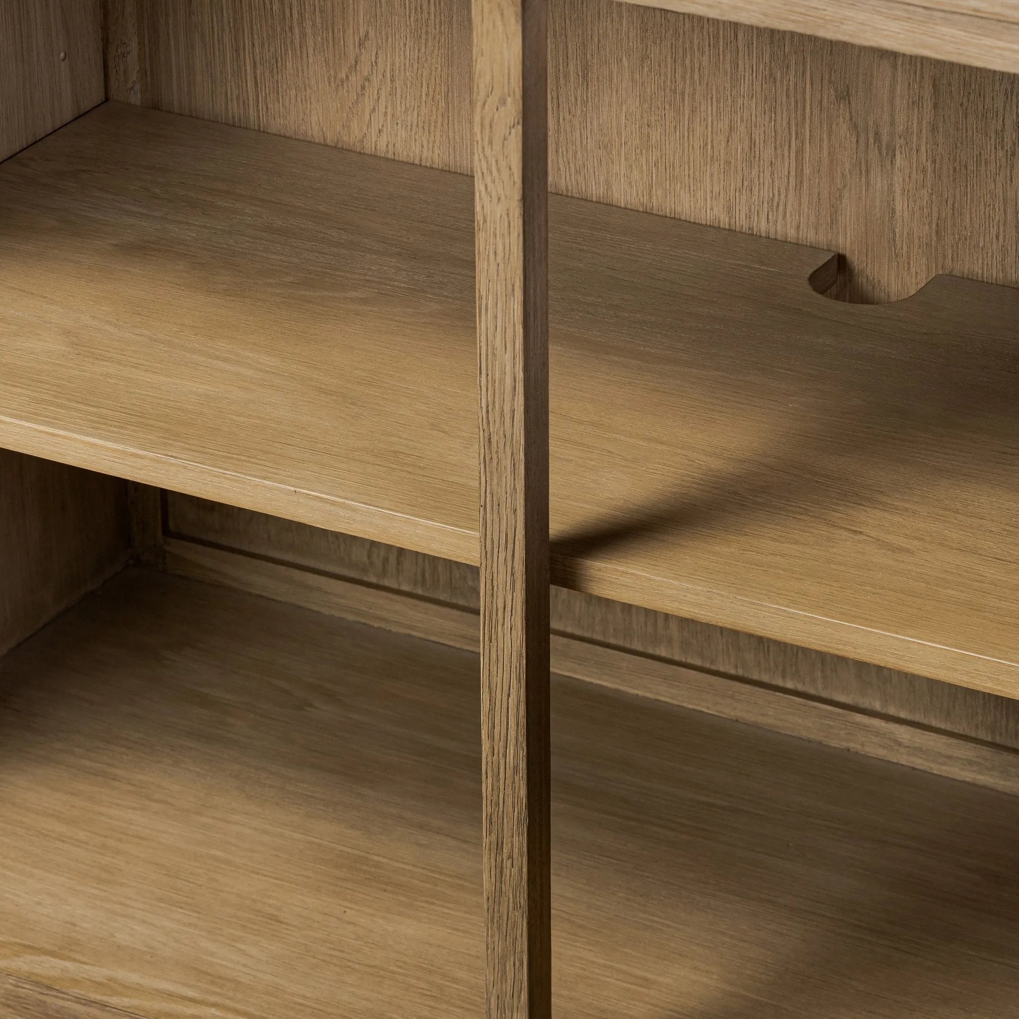 The classic sideboard takes new shape with a unique gallery design on top. Doors are fixed with a functional lock. Aged bronze hardware complements a weathered washed oak finish Amethyst Home provides interior design, new home construction design consulting, vintage area rugs, and lighting in the Los Angeles metro area.