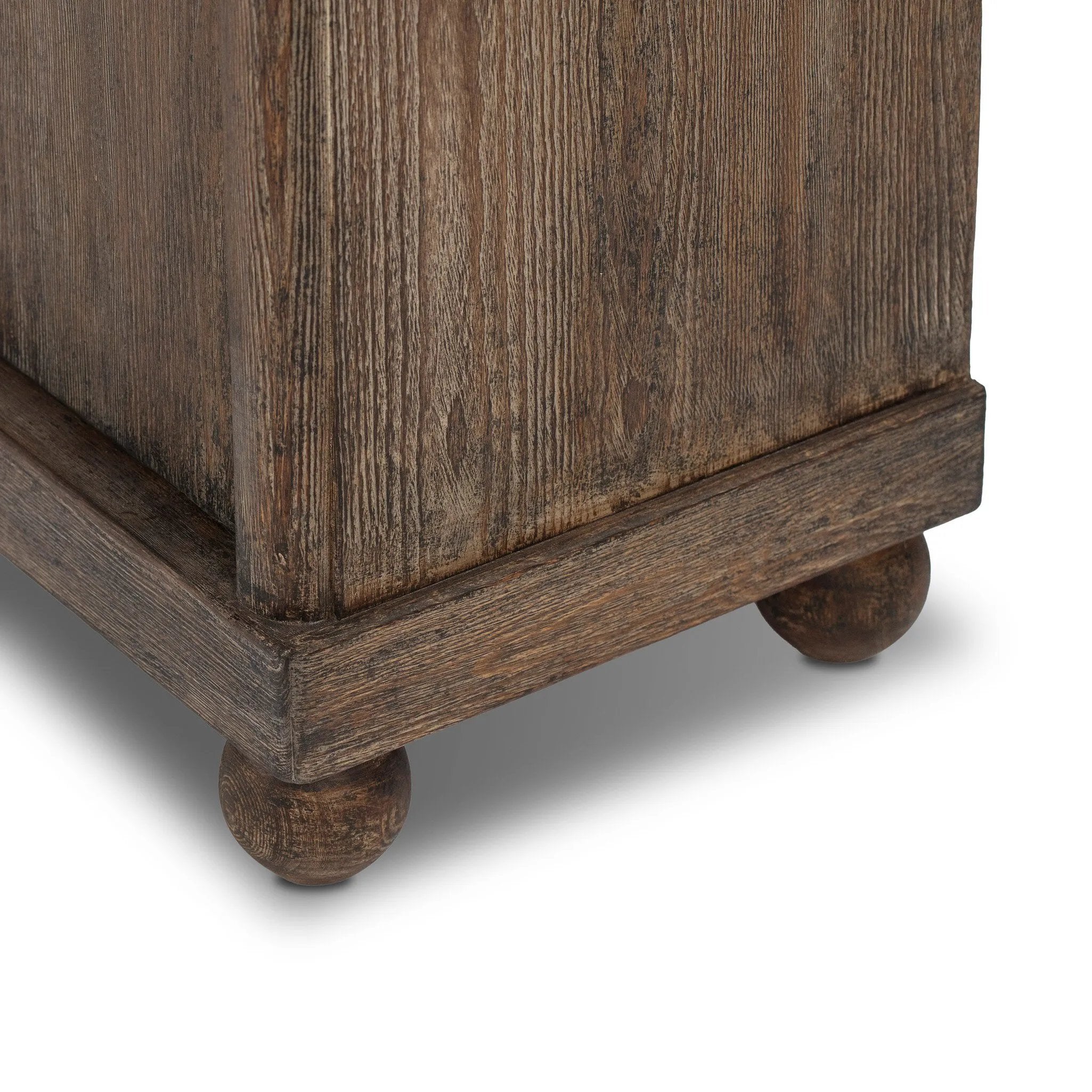 Taking after an antique from China, this inspired cabinet features overlapping double doors and rounded accents. Crafted from solid pine and veneers in a distressed finish for a rustic look Amethyst Home provides interior design, new home construction design consulting, vintage area rugs, and lighting in the Dallas metro area.