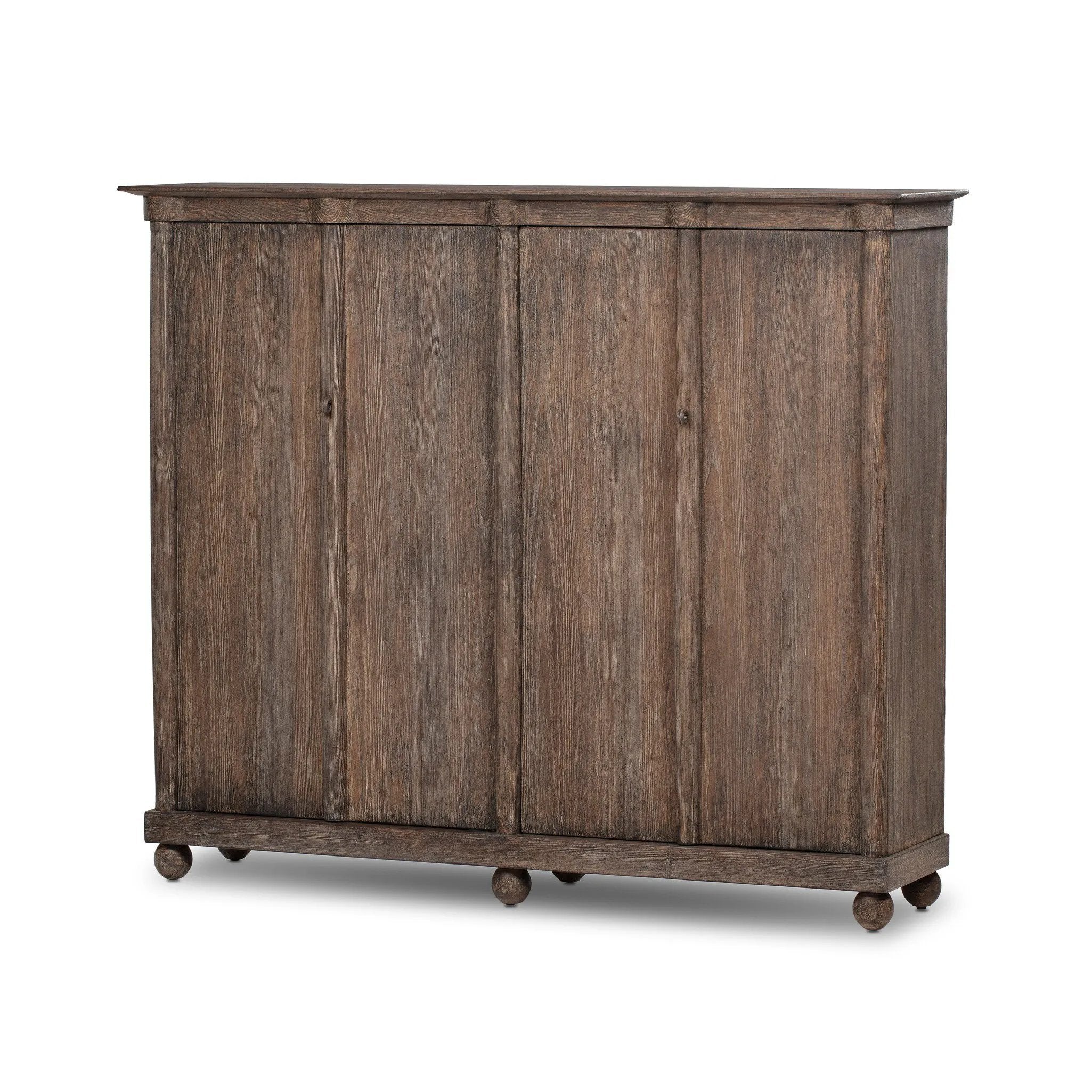 Taking after an antique from China, this inspired cabinet features overlapping double doors and rounded accents. Crafted from solid pine and veneers in a distressed finish for a rustic look Amethyst Home provides interior design, new home construction design consulting, vintage area rugs, and lighting in the Houston metro area.