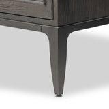 Baroque-period detailing gives this oak cabinet its  classic look. Made from black oak with a metal base and ring pulls, as well as cabriole-like legs to soften the lines Amethyst Home provides interior design, new home construction design consulting, vintage area rugs, and lighting in the Boston metro area.
