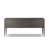 Baroque-period detailing gives this oak desk its  classic look. Made from worn black oak with metal ring pulls on its four drawers, as well as cabriole-like legs to soften the lines Amethyst Home provides interior design, new home construction design consulting, vintage area rugs, and lighting in the Boston metro area.