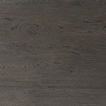 Baroque-period detailing gives this oak desk its  classic look. Made from worn black oak with metal ring pulls on its four drawers, as well as cabriole-like legs to soften the lines Amethyst Home provides interior design, new home construction design consulting, vintage area rugs, and lighting in the Scottsdale metro area.