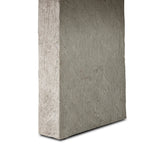 This outdoor dining table features a double pedestal silhouette that's defined by striking contrast between a smooth, refined top and heavily textured legs for a look that's straight from the quarry. It comes together with a water transfer technique on concrete that mimics natural marble. Amethyst Home provides interior design, new home construction design consulting, vintage area rugs, and lighting in the Los Angeles metro area.