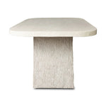 This outdoor dining table features a double pedestal silhouette that's defined by striking contrast between a smooth, refined top and heavily textured legs for a look that's straight from the quarry. It comes together with a water transfer technique on concrete that mimics natural marble. Amethyst Home provides interior design, new home construction design consulting, vintage area rugs, and lighting in the San Diego metro area.