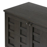 A transitional piece that works into your collection with ease. This solid oak sideboard is finished in a smoked black, highlighting natural graining inherent to rich character woods. Grid-like patterned doors bring dimension to clean, simple shaping, while interior shelving awaits storage of dinnerware, table linens and more. Amethyst Home provides interior design, new home construction design consulting, vintage area rugs, and lighting in the Park City metro area.