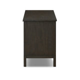 A transitional piece that works into your collection with ease. This solid oak sideboard is finished in a smoked black, highlighting natural graining inherent to rich character woods. Grid-like patterned doors bring dimension to clean, simple shaping, while interior shelving awaits storage of dinnerware, table linens and more. Amethyst Home provides interior design, new home construction design consulting, vintage area rugs, and lighting in the Portland metro area.