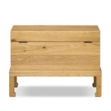 Inspired by classic Chinese antiques, this heritage-style trunk blends timeless design with modern functionality. Crafted from oak with a light, toasted finish, bronzed latch-and-key hardware adds a playful design detail Amethyst Home provides interior design, new home construction design consulting, vintage area rugs, and lighting in the Tampa metro area.