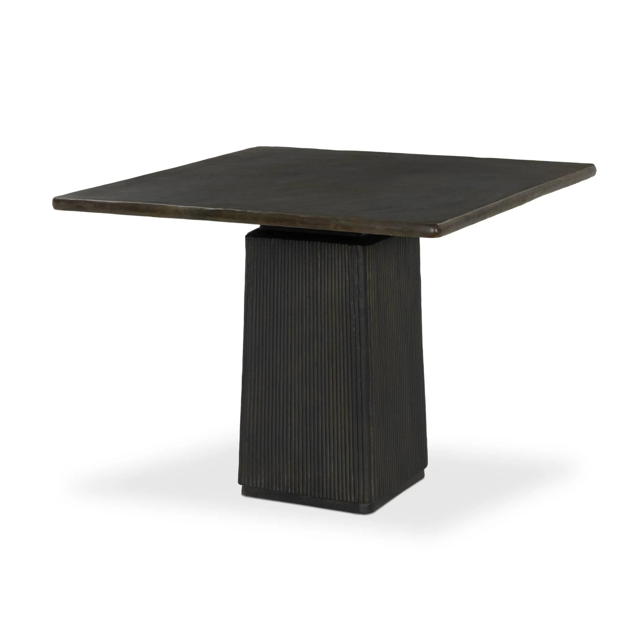 This bistro-sized outdoor table features a pedestal-style base with a reeded bronze finish, adding dimension that catches the light. Cover or store inside during inclement weather and when not in use.As enthusiasts of clean materials at Amethyst, we love the designer inspired Althea Outdoor Dining Table-38" - Textured Bronze Aluminum. Amethyst Home provides interior design, new home construction design consulting, vintage area rugs, and lighting in the Kansas City metro area.