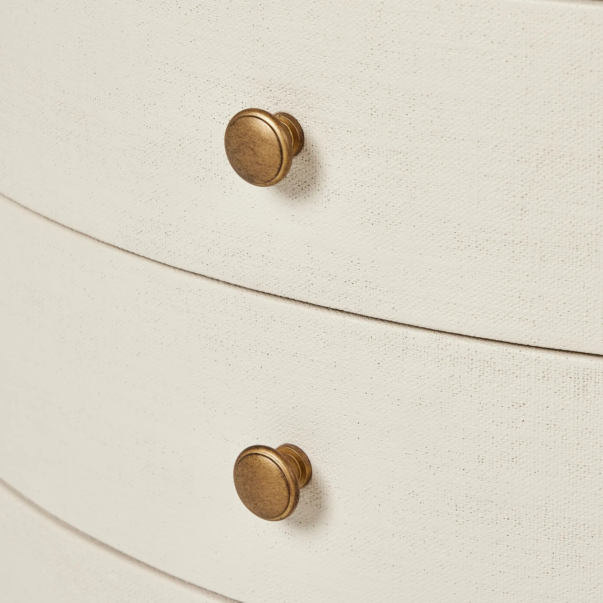 Featuring Amelia Ivory Painted Linen Oval Nightstand by Four Hands at Amethyst Home. Uniquely made from ivory-painted linen, a beautifully curved nightstand shapes four drawers for generous bedside storage.Overall Dimensions: 26.00"w x 20.00"d x 24.00"hWeight : 87.08 lbsMaterials: Painted Linen, Engineered Hardwood. Amethyst Home provides interior design, new home construction design consulting, vintage area rugs, and lighting in the Los Angeles metro area.