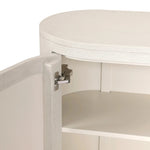 Uniquely made from ivory-painted linen, a beautifully curved sideboard gives shape to generous storage for dinnerware, linens and more Amethyst Home provides interior design, new home construction design consulting, vintage area rugs, and lighting in the Los Angeles metro area.