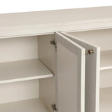 Uniquely made from ivory-painted linen, a beautifully curved sideboard gives shape to generous storage for dinnerware, linens and more Amethyst Home provides interior design, new home construction design consulting, vintage area rugs, and lighting in the Tampa metro area.