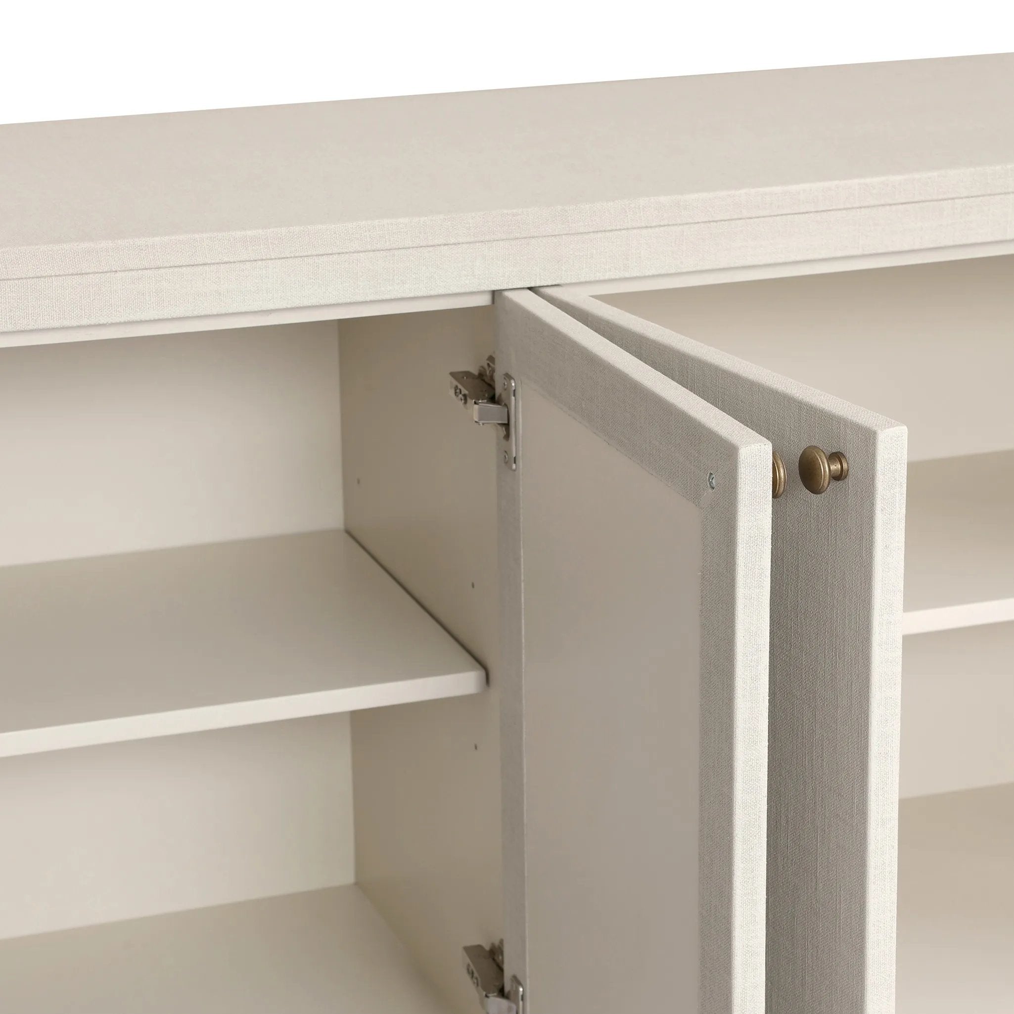 Uniquely made from ivory-painted linen, a beautifully curved sideboard gives shape to generous storage for dinnerware, linens and more Amethyst Home provides interior design, new home construction design consulting, vintage area rugs, and lighting in the Tampa metro area.