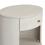 Uniquely made from ivory-painted linen, a beautifully curved nightstand shapes a single drawer and an open cubby for generous bedside storage Amethyst Home provides interior design, new home construction design consulting, vintage area rugs, and lighting in the Los Angeles metro area.