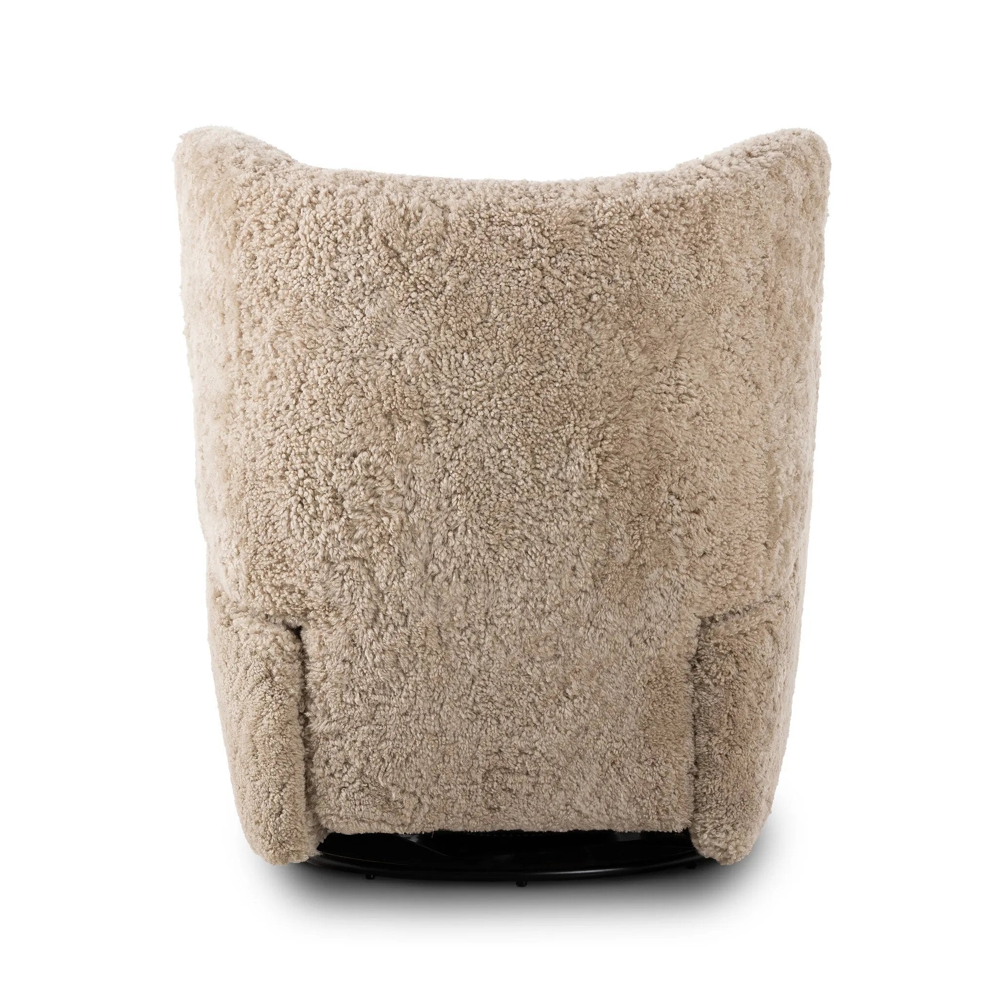 Relax into the curved arms and subtle wingback shape of this classic reading chair, featuring a reclining mechanism for ultimate comfort. Upholstered in an ethically sourced, natural beige shearling for extra comfort and texture. Crafted with S-spring suspension, a loose cushion and hidden legs beneath. Amethyst Home provides interior design, new home construction design consulting, vintage area rugs, and lighting in the San Diego metro area.