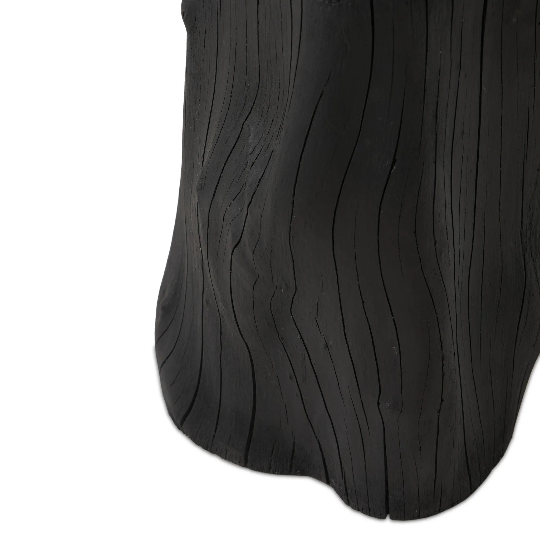 Ground any room with a style inspired by the beautiful simplicity of nature. Made of black-finished resin, the form for this special piece is molded from a tree trunk, then cast in resin to recreate the same shape and texture of the trunk — talk about a true statement piece Amethyst Home provides interior design, new home construction design consulting, vintage area rugs, and lighting in the Laguna Beach metro area.