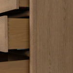 Crafted from sandy solid oak in a waterfall silhouette, this dresser adds a touch of contemporary simplicity to your bedroom. A bullnose edge and oval iron drawer pulls add variety.As lovers of natural design at Amethyst, we love the designer inspired Analisa 6 Drawer Dresser - Sandy Oak. Amethyst Home provides interior design, new home construction design consulting, vintage area rugs, and lighting in the Portland metro area.