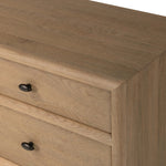 Crafted from sandy solid oak in a waterfall silhouette, this storage-driven dresser adds a touch of contemporary simplicity to your bedroom. A bullnose edge and oval iron drawer pulls add variety.As enthusiasts of modern design at Amethyst, we love the designer inspired Analisa 9 Drawer Dresser - Sandy Oak. Amethyst Home provides interior design, new home construction design consulting, vintage area rugs, and lighting in the Kansas City metro area.