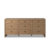 Crafted from sandy solid oak in a waterfall silhouette, this storage-driven dresser adds a touch of contemporary simplicity to your bedroom. A bullnose edge and oval iron drawer pulls add variety.As enthusiasts of modern design at Amethyst, we love the designer inspired Analisa 9 Drawer Dresser - Sandy Oak. Amethyst Home provides interior design, new home construction design consulting, vintage area rugs, and lighting in the Monterey metro area.