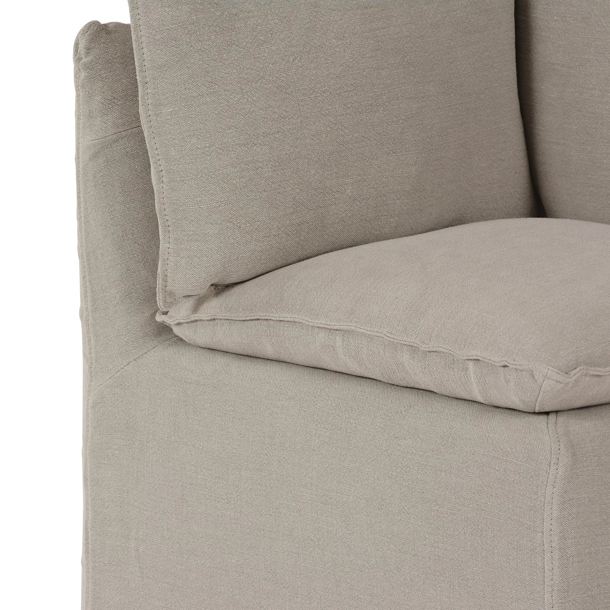 Featuring Andre Slipcovered Linen Dining Banquette Corner by Four Hands at Amethyst Home. This Andre Broadway Stone Slipcover Dining Corner Piece is the perfect solution for your dining needs. With its versatile design and comfortable sofa feature, it offers both style and functionality. Made with quality materials, it provides durability and long-lasting. Amethyst Home provides interior design, new home construction design consulting, vintage area rugs, and lighting in the Kansas City metro area.