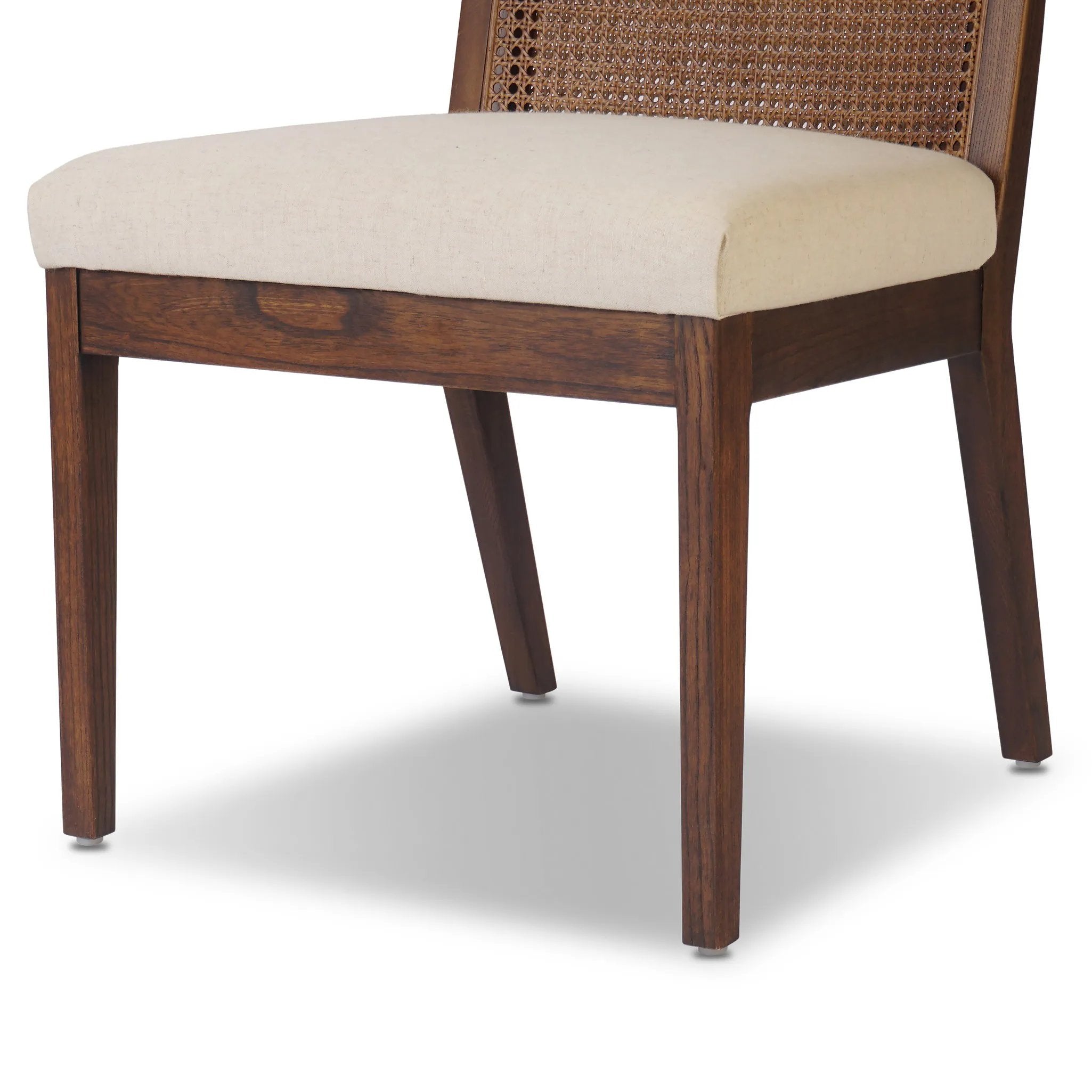 Featuring Antonia Savile Flax Cane Armless Dining Chair by Four Hands at Amethyst Home. Mixed materials refresh a retro style. Cane frames performance fabric seating with slight distressing, bringing more character to the seat. Performance fabrics are specially created to withstand spills, stains, high traffic and wear, ensuring long-term comfort and unmatched . Amethyst Home provides interior design, new home construction design consulting, vintage area rugs, and lighting in the Miami metro area.