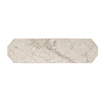 Monolithic and bold, this pedestal-style console table is constructed of precisely cut, creamy brown marble. Angular edges and cut corners bring smooth surface transitions for subtle visual and geometric intrigue Amethyst Home provides interior design, new home construction design consulting, vintage area rugs, and lighting in the Salt Lake City metro area.