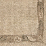 Patterned with a simplistic three-emblem motif framed by a narrow border, this hand-knotted wool rug adds just a touch of neutral design. The durable runner is crafted to wear beautifully over time. Due to the handcrafted nature of this rug, slight variations in sizing may occur Amethyst Home provides interior design, new home construction design consulting, vintage area rugs, and lighting in the Charlotte metro area.
