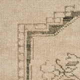 Patterned with a simplistic three-emblem motif framed by a narrow border, this hand-knotted wool rug adds just a touch of neutral design. The durable runner is crafted to wear beautifully over time. Due to the handcrafted nature of this rug, slight variations in sizing may occur Amethyst Home provides interior design, new home construction design consulting, vintage area rugs, and lighting in the Laguna Beach metro area.