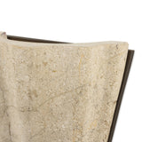 Turned Italian marble in a curved scalloped shape directs the light beautifully. The sculpted stone's organic tones and brushed brass iron back plating make for high-quality, décor-driven detail Amethyst Home provides interior design, new home construction design consulting, vintage area rugs, and lighting in the Boston metro area.