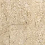 Turned Italian marble in a curved scalloped shape directs the light beautifully. The sculpted stone's organic tones and brushed brass iron back plating make for high-quality, décor-driven detail Amethyst Home provides interior design, new home construction design consulting, vintage area rugs, and lighting in the Portland metro area.