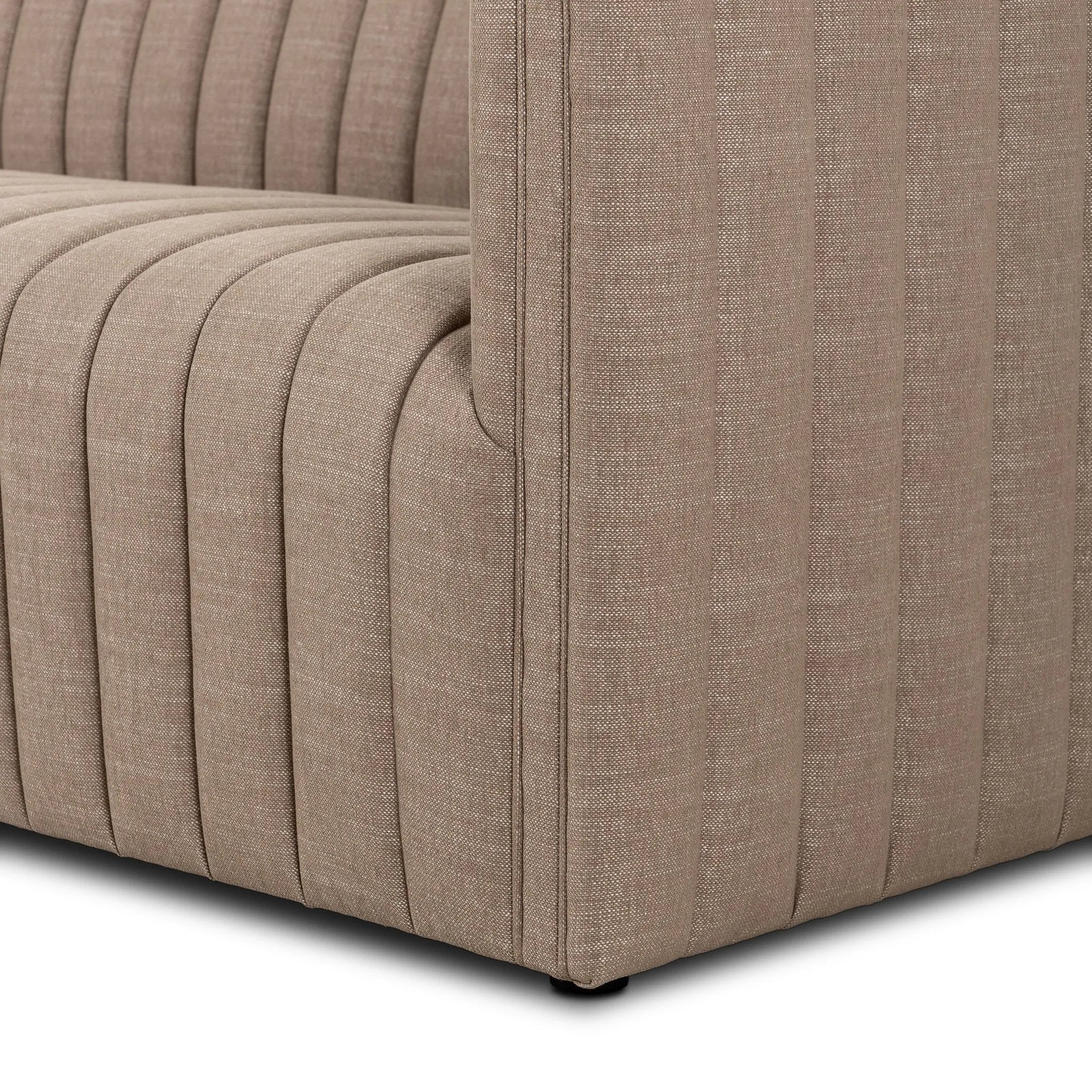 Featuring Augustine Crypton Nomad Taupe Sofa by Four Hands at Amethyst Home. Velvety poly-blend seating takes on dramatic channeling and rich navy hue for trend-forward texture and sumptuous sit.88"Overall Dimensions: 88.00"w x 35.00"d x 26.50"hWeight: 105.82 lbs97"Overall Dimensions: 97.00"w x 35.00"d x 26.50"hWeight: 123.02 lbsMaterials: 92% Polyester, 8%. Amethyst Home provides interior design, new home construction design consulting, vintage area rugs, and lighting in the Charlotte metro area.