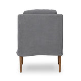 Heritage-inspired comfort. Sloping track arms are a study in playful forms, while the frame's fluid shape creates a simple, polished look. Tapered legs extend beyond a short skirt for a more relaxed style. Covered in 100% linen. A design collaboration by Amber Lewis and Four Hands. Amethyst Home provides interior design, new home construction design consulting, vintage area rugs, and lighting in the Austin metro area.