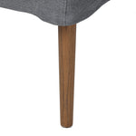 Heritage-inspired comfort. Sloping track arms are a study in playful forms, while the frame's fluid shape creates a simple, polished look. Tapered legs extend beyond a short skirt for a more relaxed style. Covered in 100% linen. A design collaboration by Amber Lewis and Four Hands. Amethyst Home provides interior design, new home construction design consulting, vintage area rugs, and lighting in the Miami metro area.