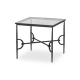 A slim frame of hammered gunmetal pairs with tempered glass, for a clean and timeless end table look. Stretchers attach to metal loops for an elevated design detail Amethyst Home provides interior design, new home construction design consulting, vintage area rugs, and lighting in the Omaha metro area.