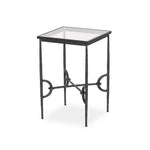 A slim, spare frame of hammered gunmetal pairs with tempered glass, for a clean and timeless end table look. Stretchers attach to metal loops for an elevated design detail Amethyst Home provides interior design, new home construction design consulting, vintage area rugs, and lighting in the Boston metro area.