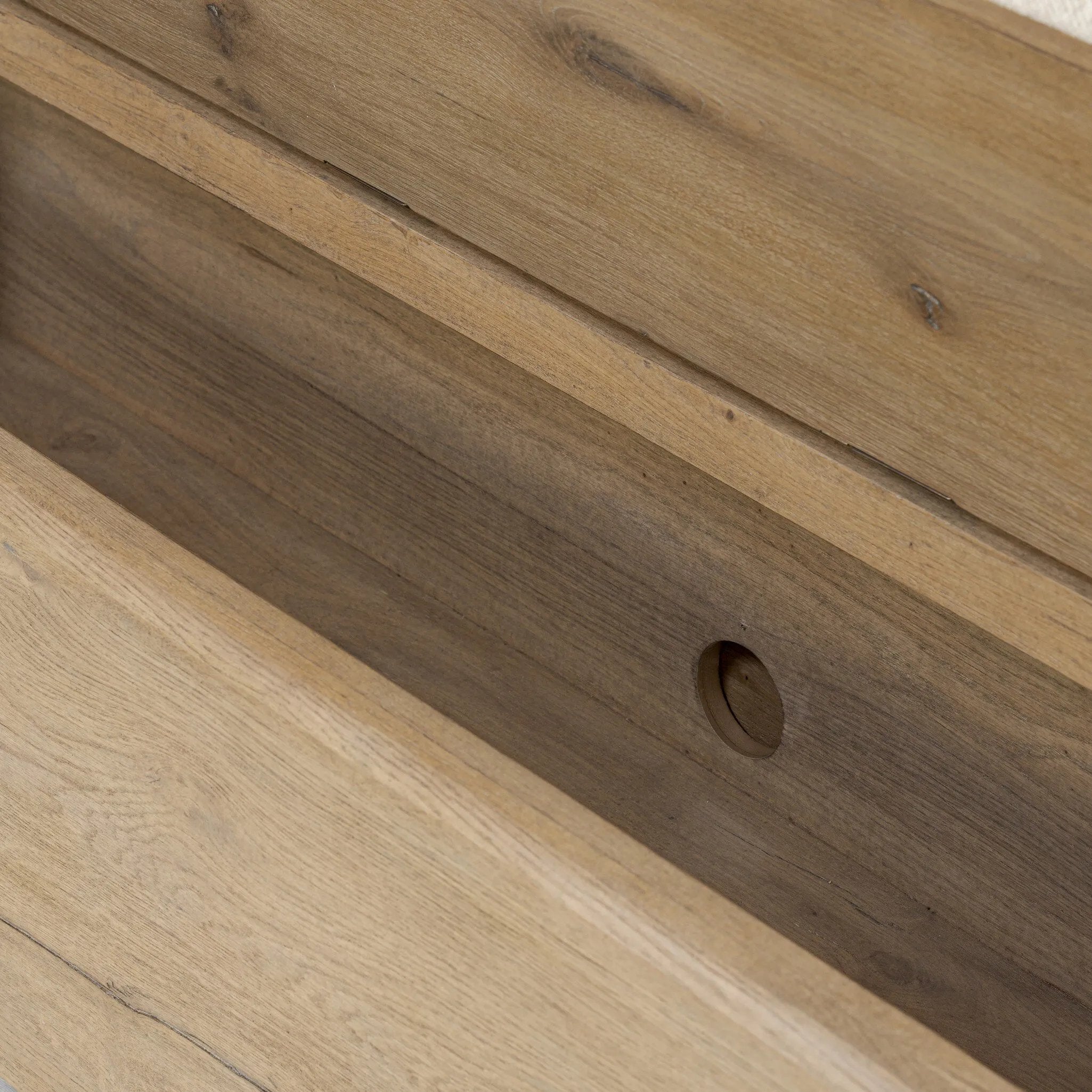 Create extra storage space wherever it's needed. This oak storage bench doubles as seating with its removable cushion upholstered in a neutral performance fabric. A scooped base lightens the look. Performance fabrics are specially created to withstand spills, stains, high traffic and wear, ensuring long-term comfort and unmatched durability Amethyst Home provides interior design, new home construction design consulting, vintage area rugs, and lighting in the Newport Beach metro area.