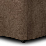 An armless dining chair fully upholstered in an inviting neutral coffee color, with a beautifully curved silhouette and arch-style cutout where the seat meets the back, creating a lightened sense of softness.As enthusiasts of modern design at Amethyst, we love the designer inspired Barclay Dining Chair - Laughlin Cafe. Amethyst Home provides interior design, new home construction design consulting, vintage area rugs, and lighting in the Austin metro area.