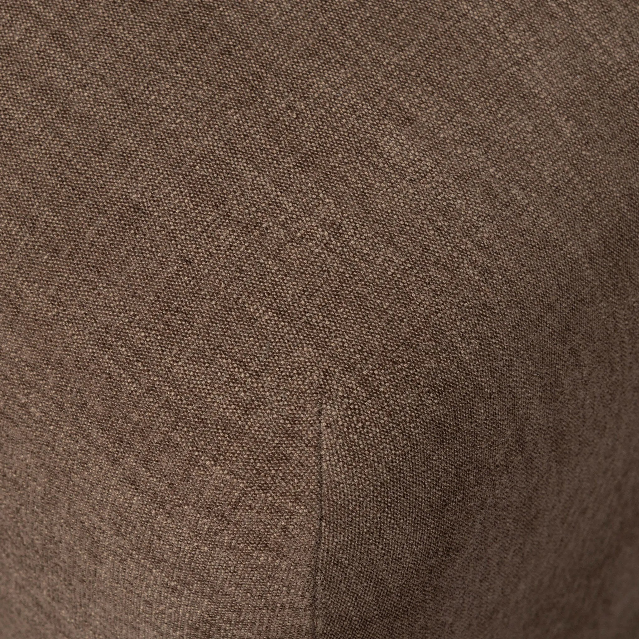 An armless dining chair fully upholstered in an inviting neutral coffee color, with a beautifully curved silhouette and arch-style cutout where the seat meets the back, creating a lightened sense of softness.As enthusiasts of modern design at Amethyst, we love the designer inspired Barclay Dining Chair - Laughlin Cafe. Amethyst Home provides interior design, new home construction design consulting, vintage area rugs, and lighting in the Charlotte metro area.