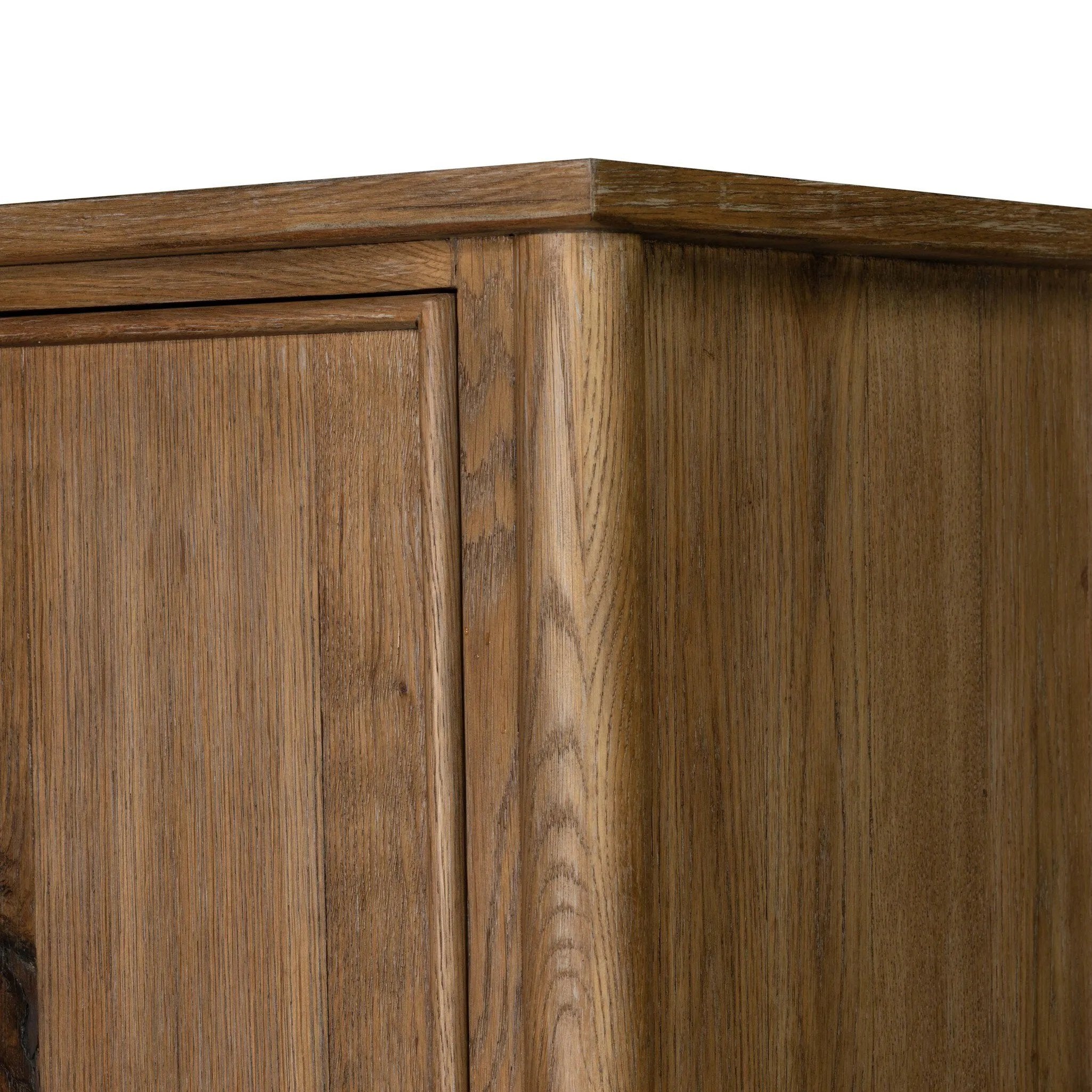 A classically constructed cabinet meets a clever storage solution. Two sets of large, flat-paneled doors conceal spacious shelves. Subtle hardware accents weathered oak. A design collaboration by Amber Lewis and Four Hands. This item has limited online distribution and may not be sold on websites without prior approval. Amethyst Home provides interior design, new home construction design consulting, vintage area rugs, and lighting in the Austin metro area.
