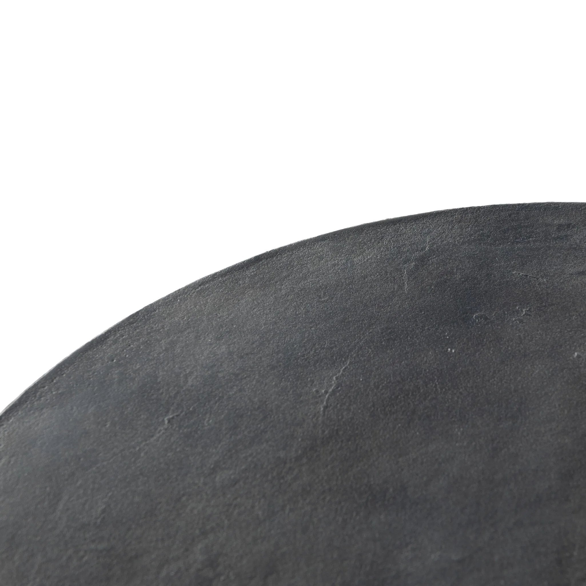 An aged grey finish highlights aluminum's natural depth, for a sleek, simple look with implied movement. Stylish indoors or out. Cover or store indoors during inclement weather and when not in use.As lovers of wabi sabi style at Amethyst, we love the warm modern inspired Basil Outdoor End Table - Aged Grey. Amethyst Home provides interior design, new home construction design consulting, vintage area rugs, and lighting in the Scottsdale metro area.