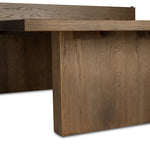 Fun meets flexibility. Two large slabs of warm grey marble, framed in rich oak, join together and sit atop the minimalist plinth bases of this dual-purpose ping pong table. The wooden "net" fastens to the table with custom gunmetal clamps, which can be easily removed for a dining table that seats 12 Amethyst Home provides interior design, new home construction design consulting, vintage area rugs, and lighting in the Miami metro area.