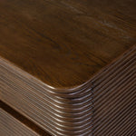 Inspired by aerodynamic-inspired Streamline Moderne style, stacked scalloped reeding wraps this spiced oak dresser with six spacious drawers. The result: a beautifully rhythmic, repeated look. With integrated hardware for a clean finish.As fans of natural materials at Amethyst, we love the nature inspired Benny 6 Drawer Dresser - Spiced Oak Veneer. Amethyst Home provides interior design, new home construction design consulting, vintage area rugs, and lighting in the Salt Lake City metro area.